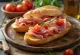 Bocadillo με χαμόν σεράνο, φρέσκια ντομάτα και σκορδάτη μπαγκέτα.